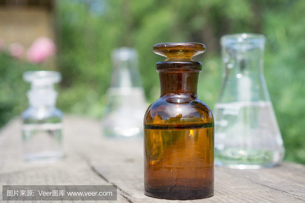 液體在化學器皿的背景植物,肥料